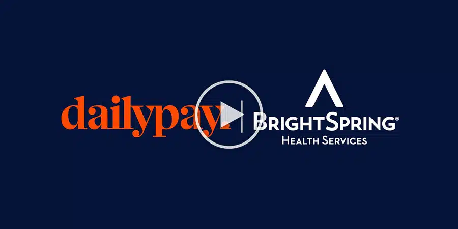 Logos for DailyPay and BrightSpring Health Services are displayed side by side on a dark background. A play button is centered between the logos.